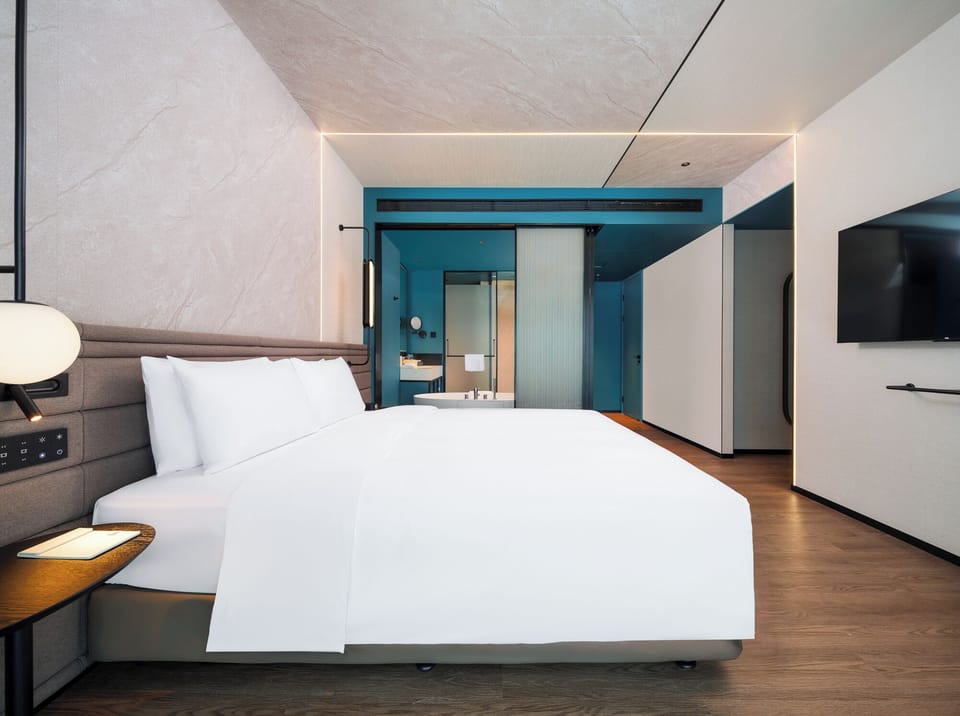 Family Suite, 2 Bedrooms | Premium bedding, down comforters, pillowtop beds, in-room safe
