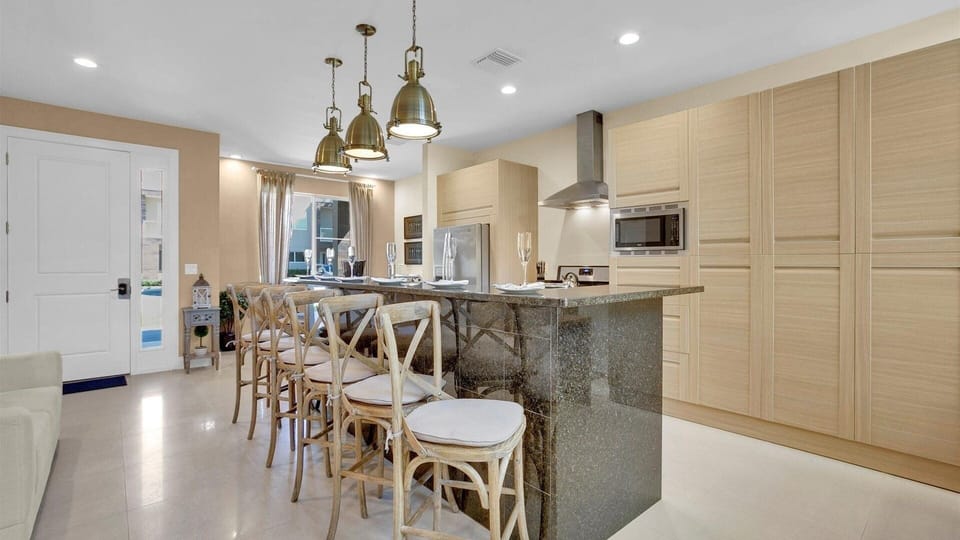Townhome, 4 Bedrooms | Private kitchen | Coffee/tea maker, fridge, oven, toaster