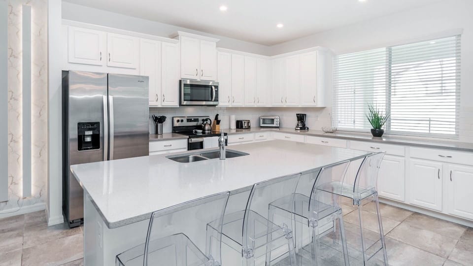 Townhome, 4 Bedrooms | Private kitchen | Coffee/tea maker, fridge, oven, toaster