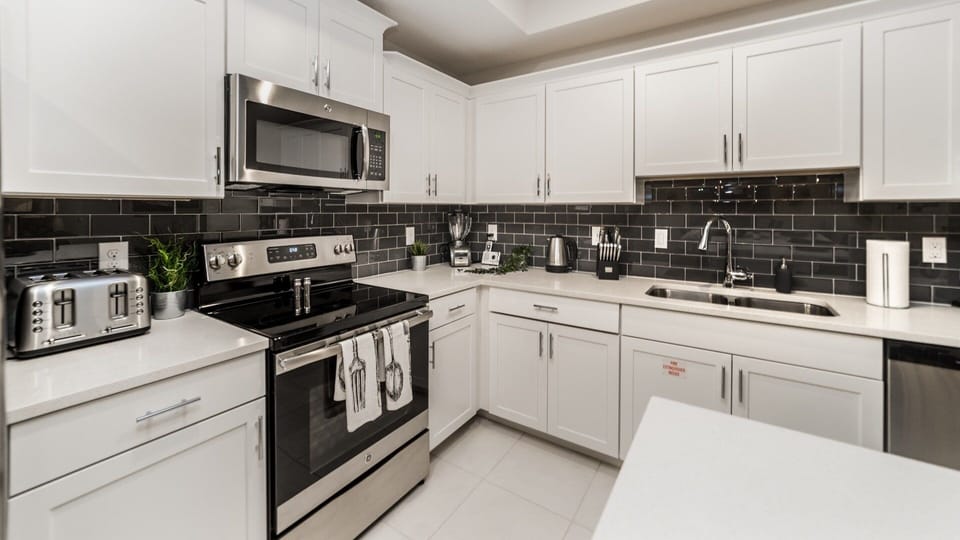 Condo, 2 Bedrooms | Private kitchen | Coffee/tea maker, fridge, oven, toaster