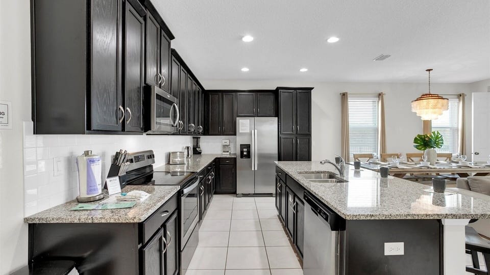 Townhome, 5 Bedrooms | Private kitchen | Coffee/tea maker, fridge, oven, toaster