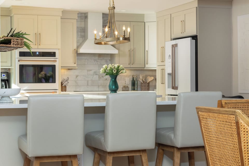 Your elegant kitchen features bar top seating