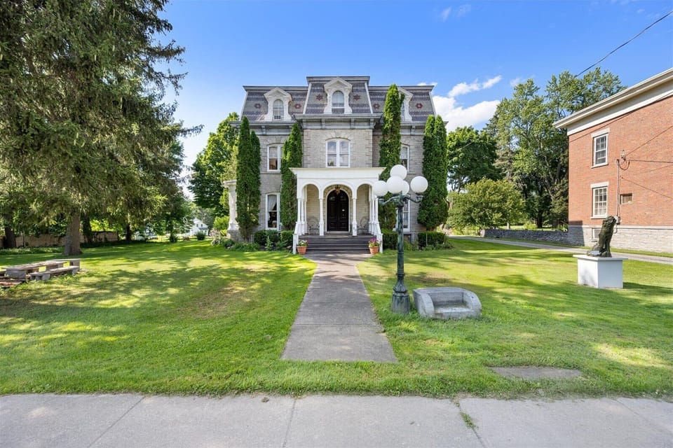 Step into timeless elegance—your stay begins at these iconic front steps.