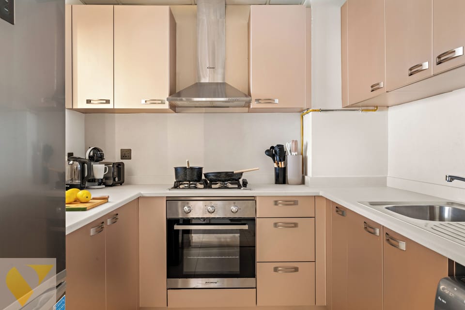 Luxury Apartment, Balcony, City View | Private kitchen | Full-size fridge, microwave, oven, stovetop