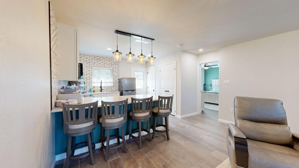 Counter seating for four, perfect for meals, snacks, or morning coffee