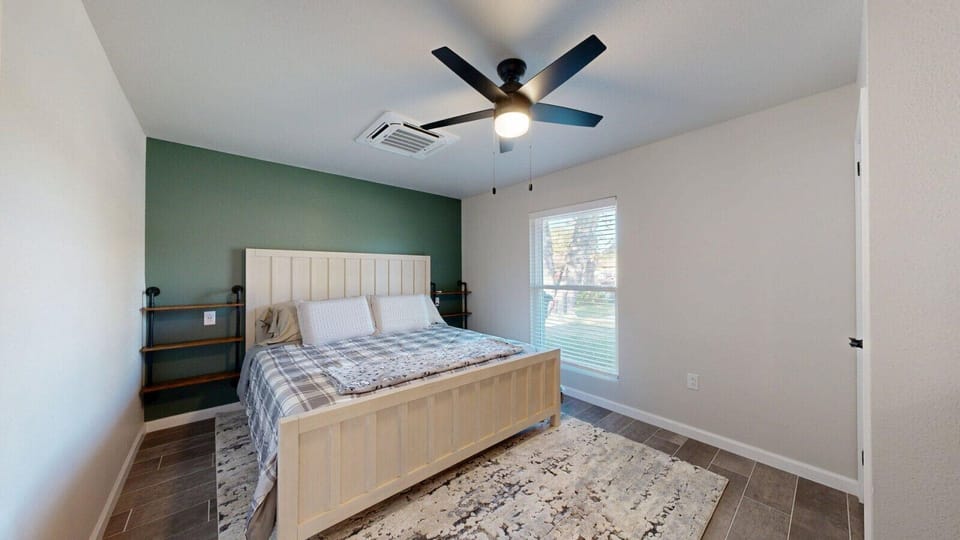 Bedroom 1: King bed and private bathroom