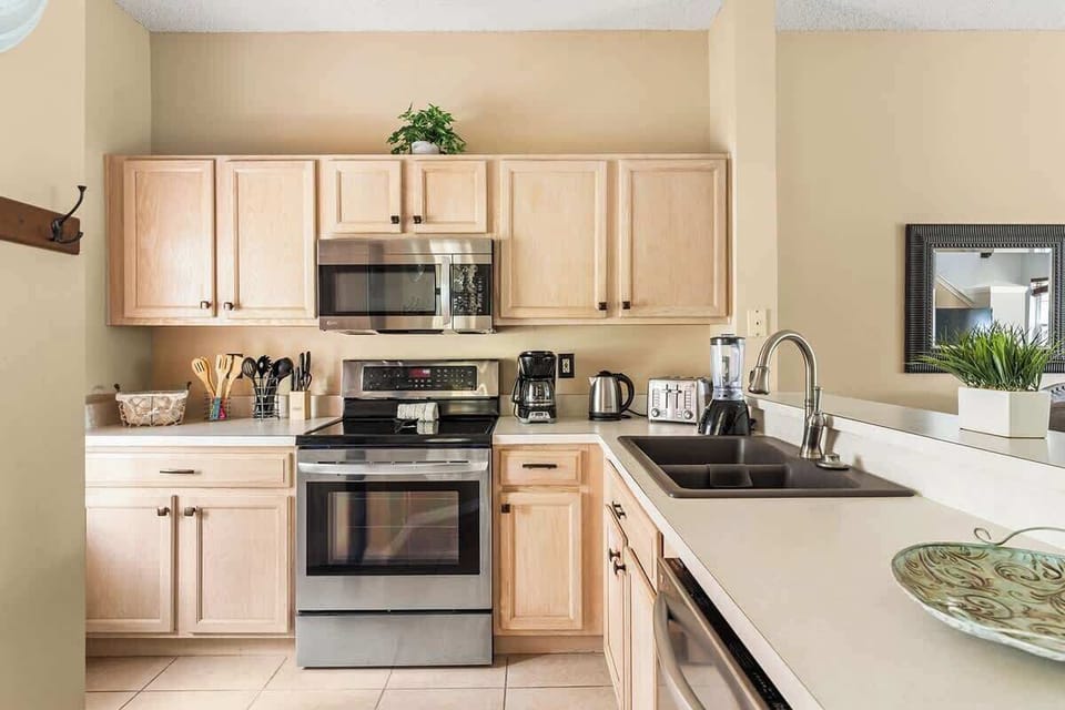 Villa (3 Bedrooms) | Private kitchen | Microwave, oven, stovetop, highchair