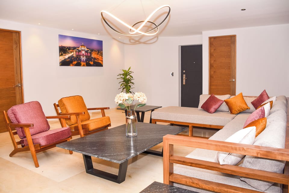 Apartment, 3 Bedrooms | Living room | Flat-screen TV
