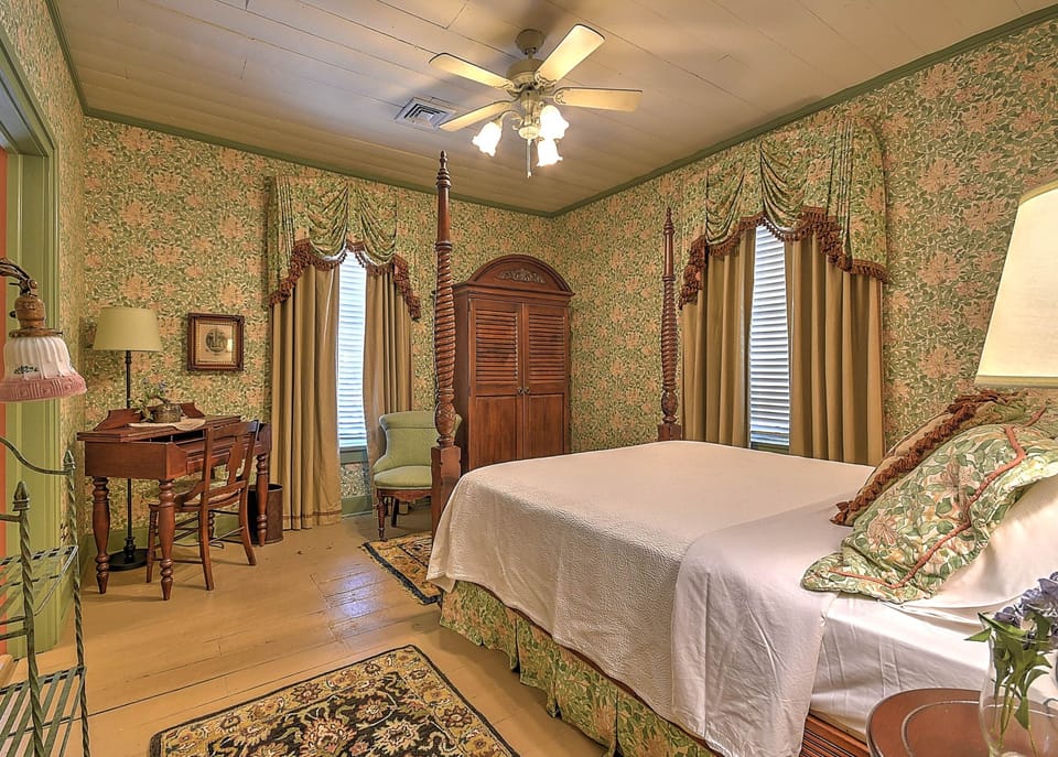 Bright, corner room with two windows overlooking Main Street