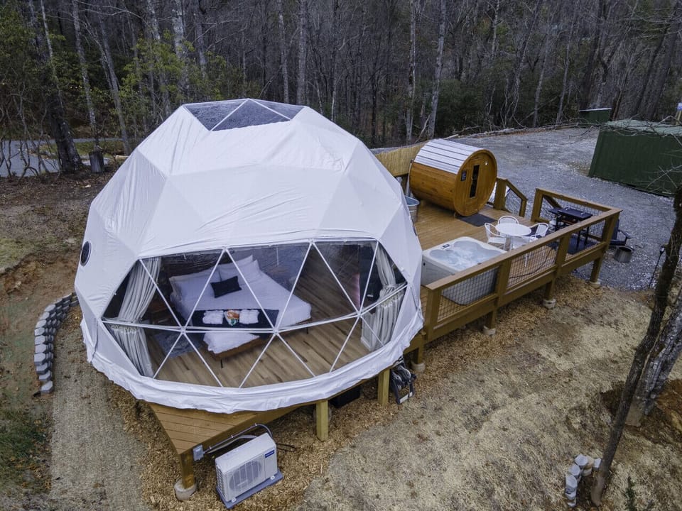 The Monarch Dome by Pisgah Domes. Our newest dome in our offerings with stargazing skylight, private sauna and hot tub.