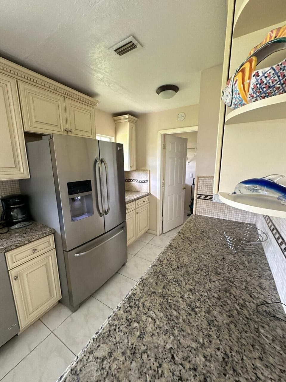 refrigerator and access to laundry room