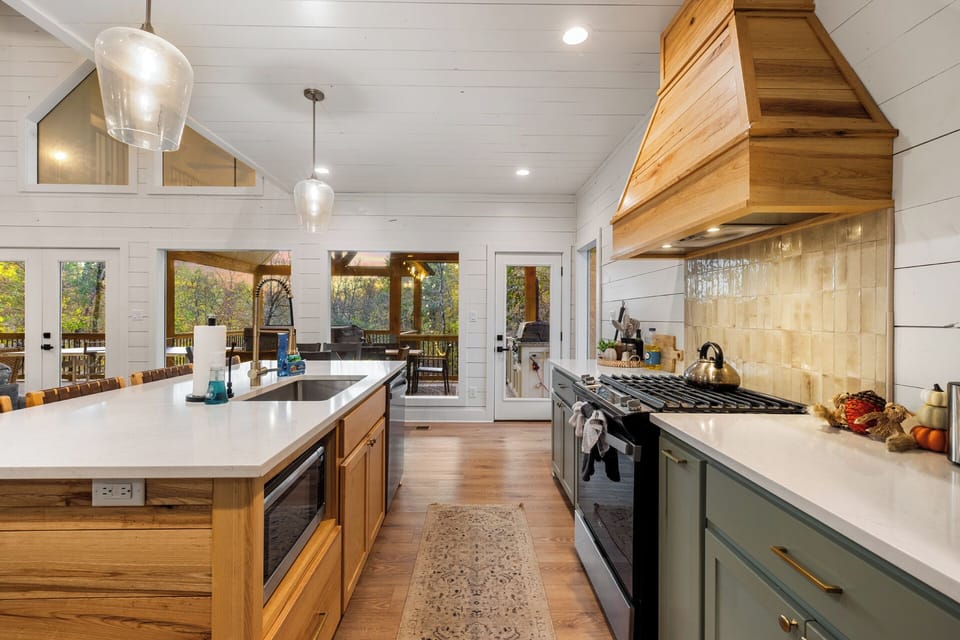Cook with ease in the fully stocked kitchen — complete with modern appliances, cookware, and even kid-friendly dishware.