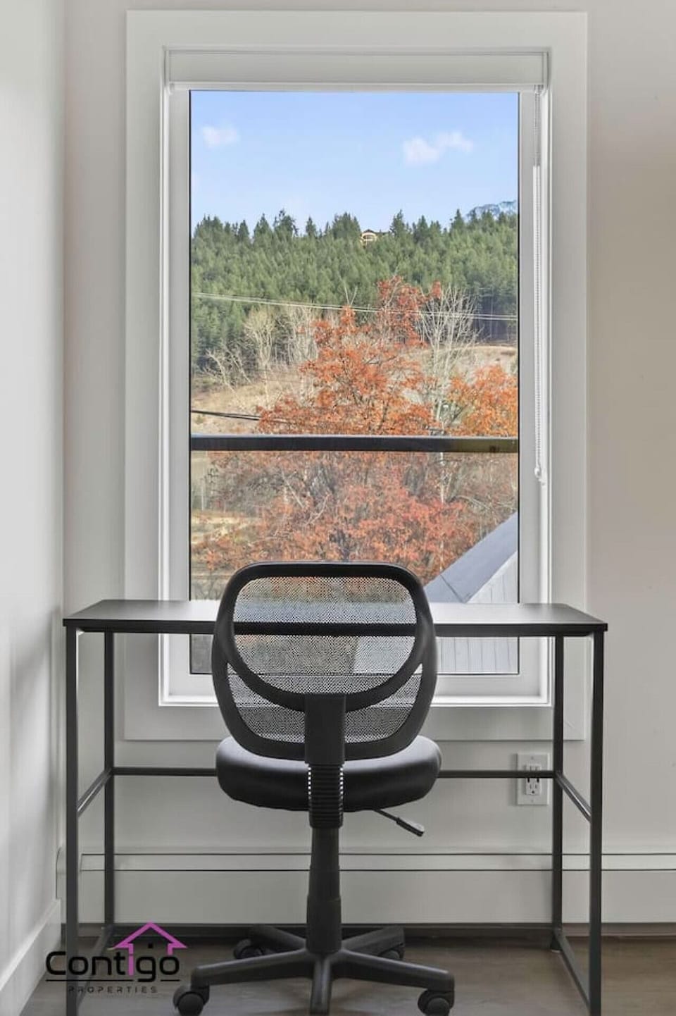 Work remotely in style with this dedicated desk and breathtaking Golden, BC forest and mountain views — ideal for extended stays and workcations near Kicking Horse Mountain Resort.