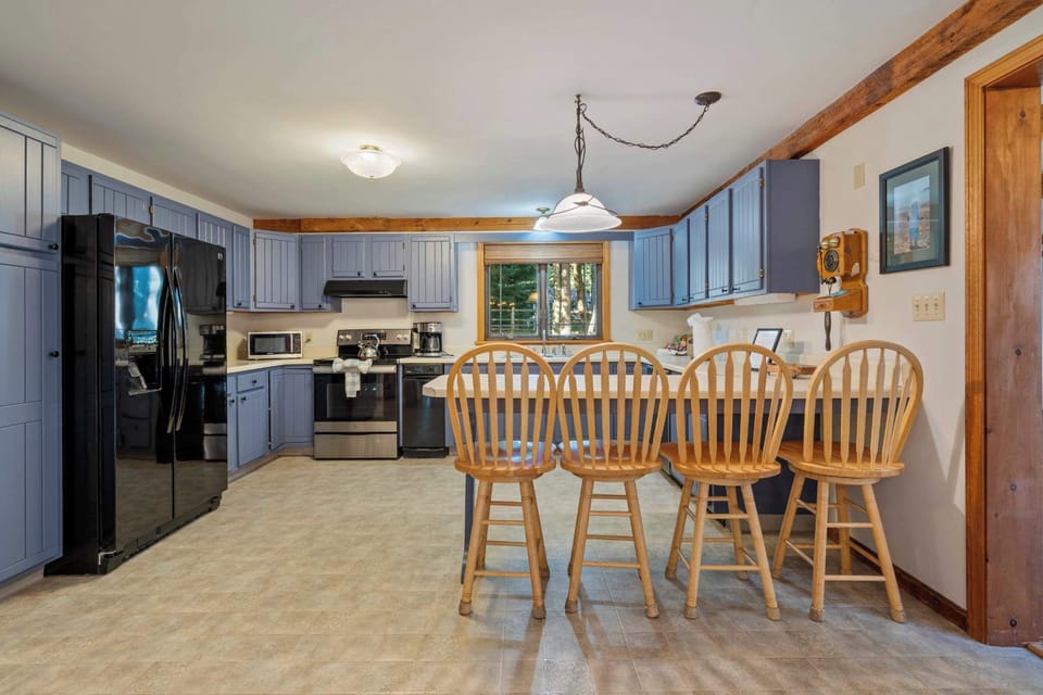 The open kitchen offers ample space & all the comforts of home​