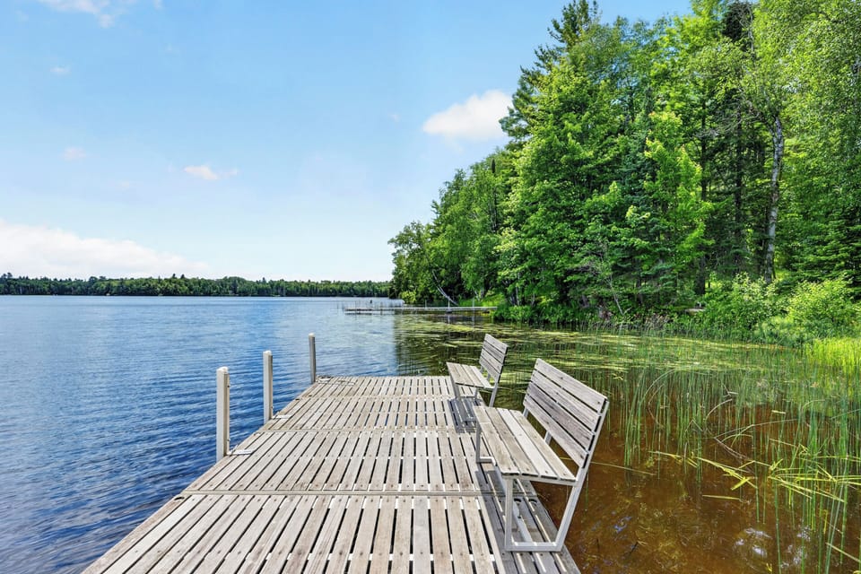 A large dock with benches.