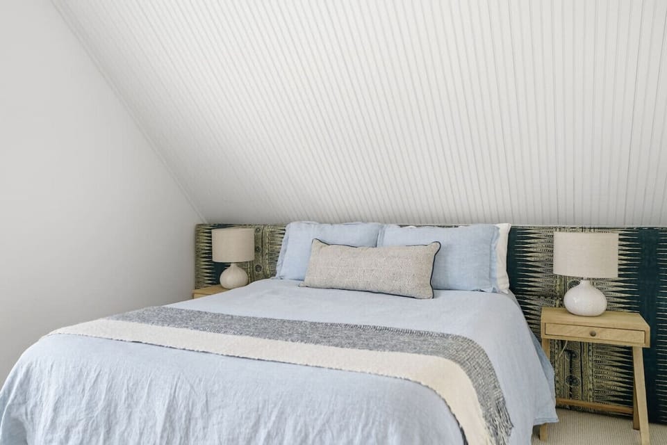 Soft linens, calming tones, and total comfort