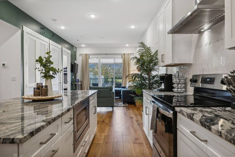 (Crazy Town 203) Chic and modern, this kitchen is perfect for cooking up your favorite dishes with brand new appliances.