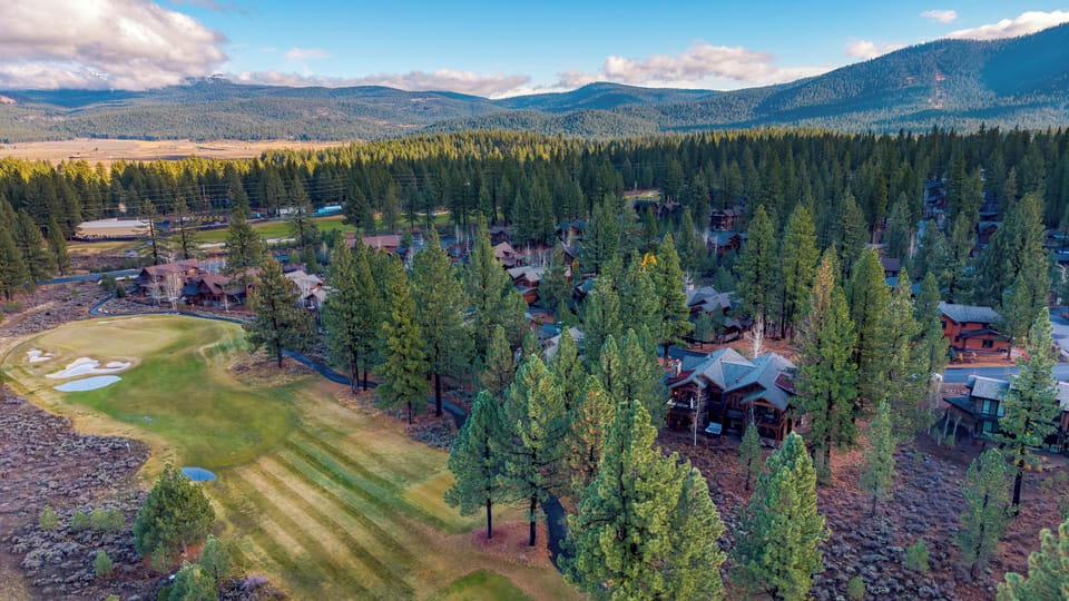 Surrounded by towering pines and sweeping golf course scenery in Schaffer’s Mill.