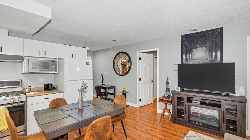 Knockan Hill Rentals - Ground Floor Suite | Living area | 54-inch TV with premium channels, fireplace