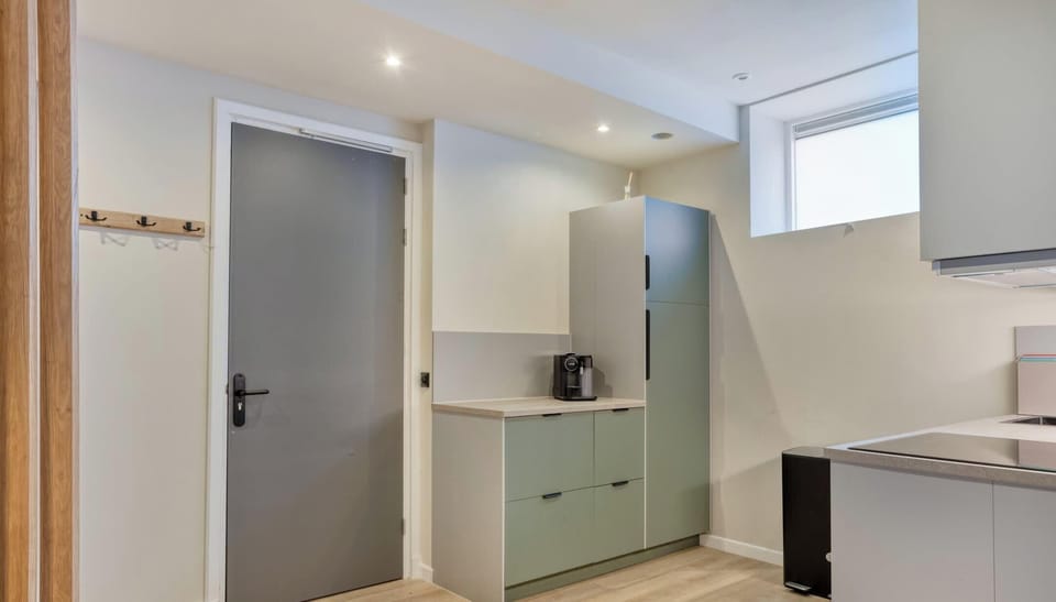 Bright kitchen and smart layout lead straight into your private retreat.