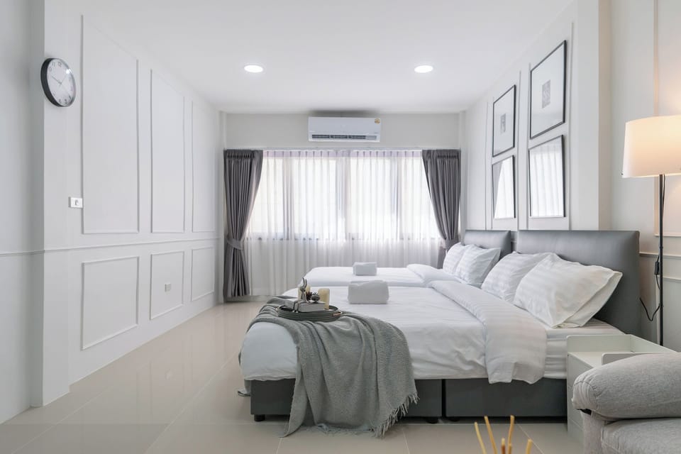 Deluxe Quadruple Room, 2 Queen Beds, Non Smoking | Desk, iron/ironing board, free WiFi