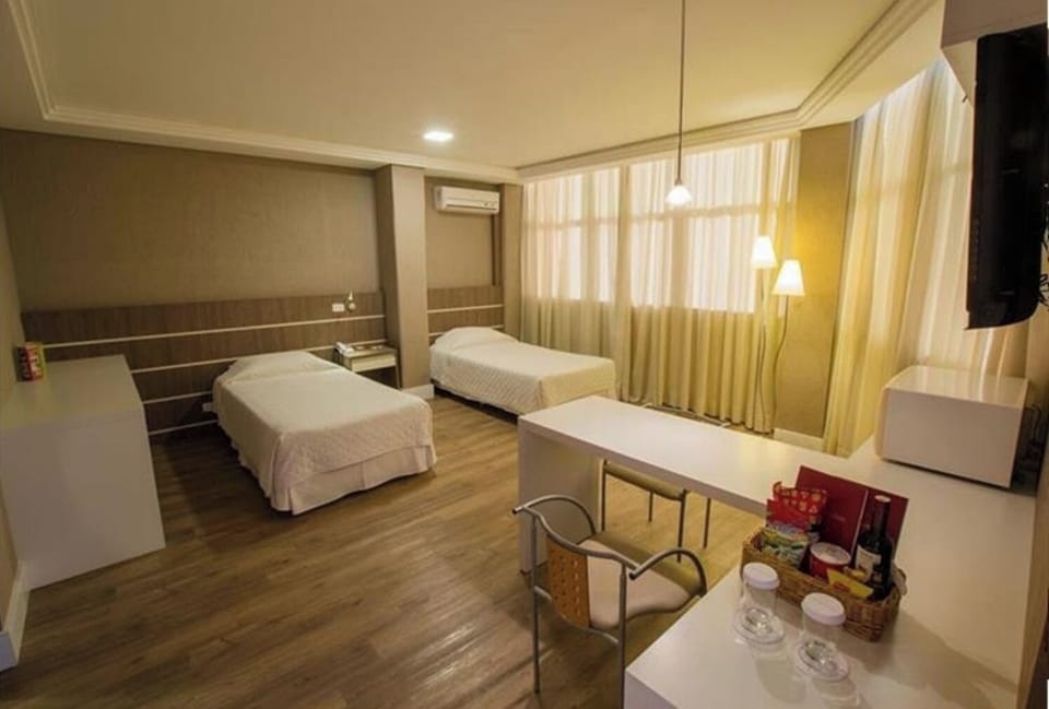 Unwind in a bright room with comfy beds and daylight.