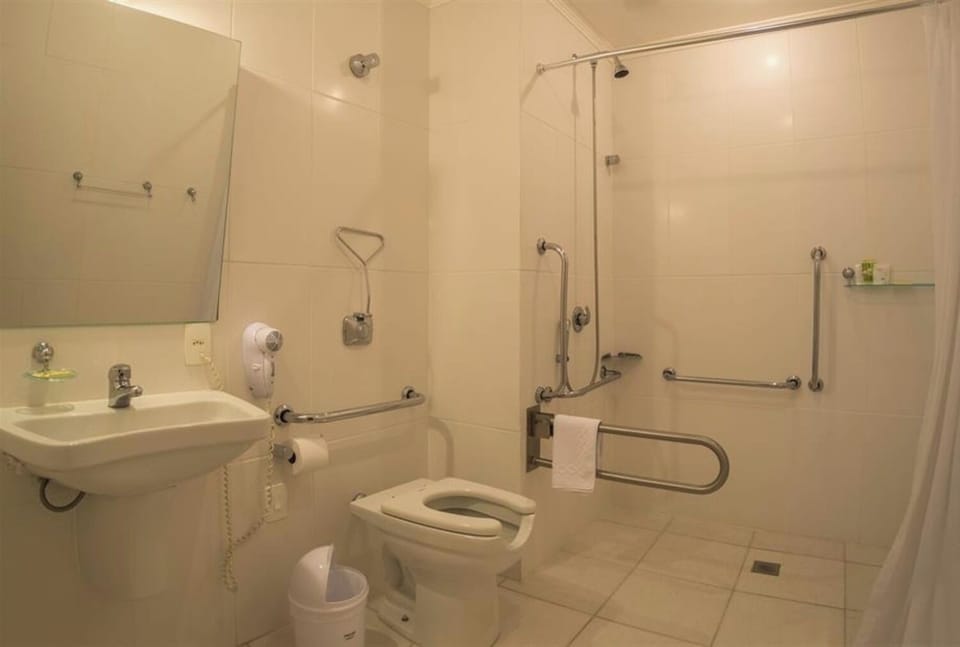Freshen up easily in a bright, accessible bathroom and shower.