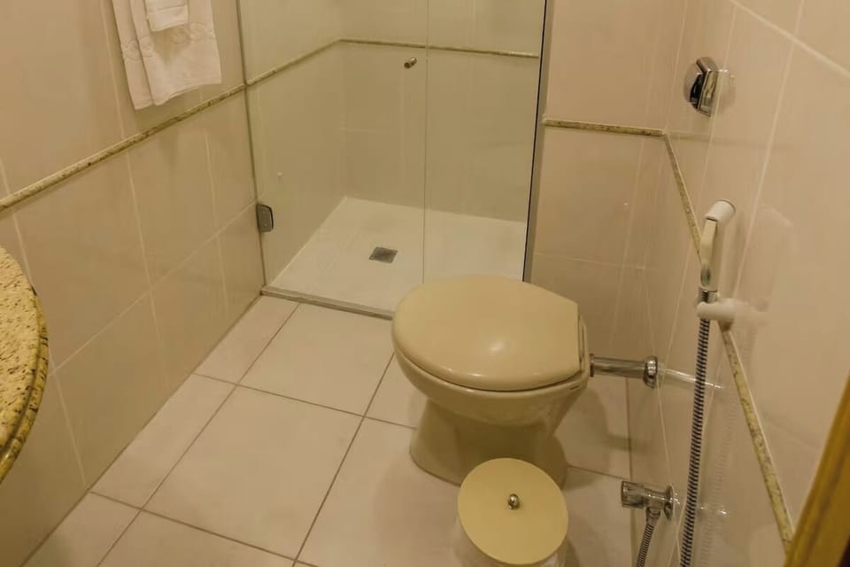 Enjoy a clean, private bath with glass shower enclosure.