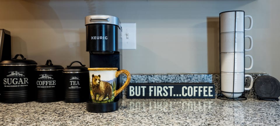 Enjoy the convenient coffee bar with a Keurig and limited complimentary items.