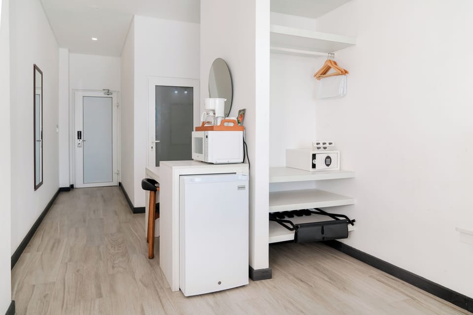 Clothing storage, mini fridge, microwave