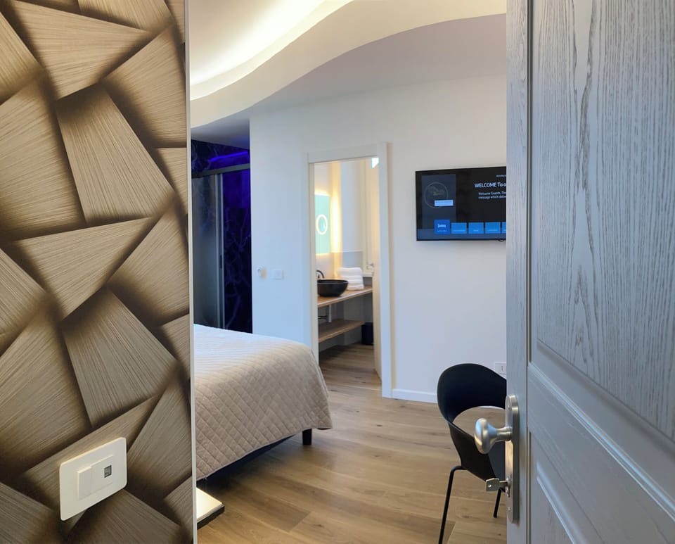 Superior Double Room, Balcony, City View | Minibar, in-room safe, individually decorated, individually furnished