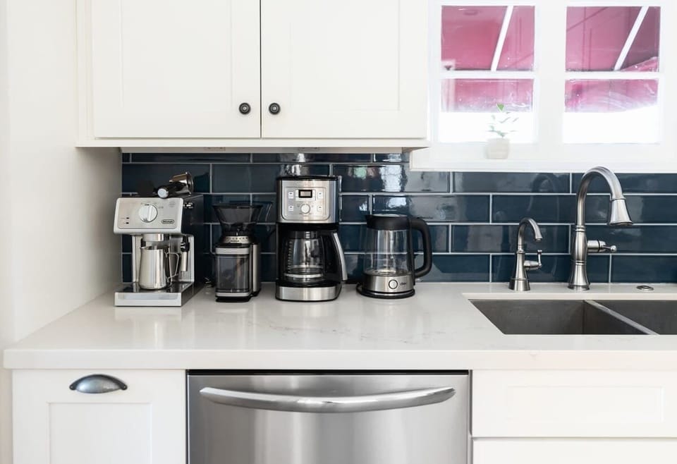 Since coffee (& tea) is critical, we offer: espresso machine, grinder, electric drip machine, french press (not shown) and electric kettle. Also offering quality filtered water (top-of-the-line RO system with medical grade water filtration system).