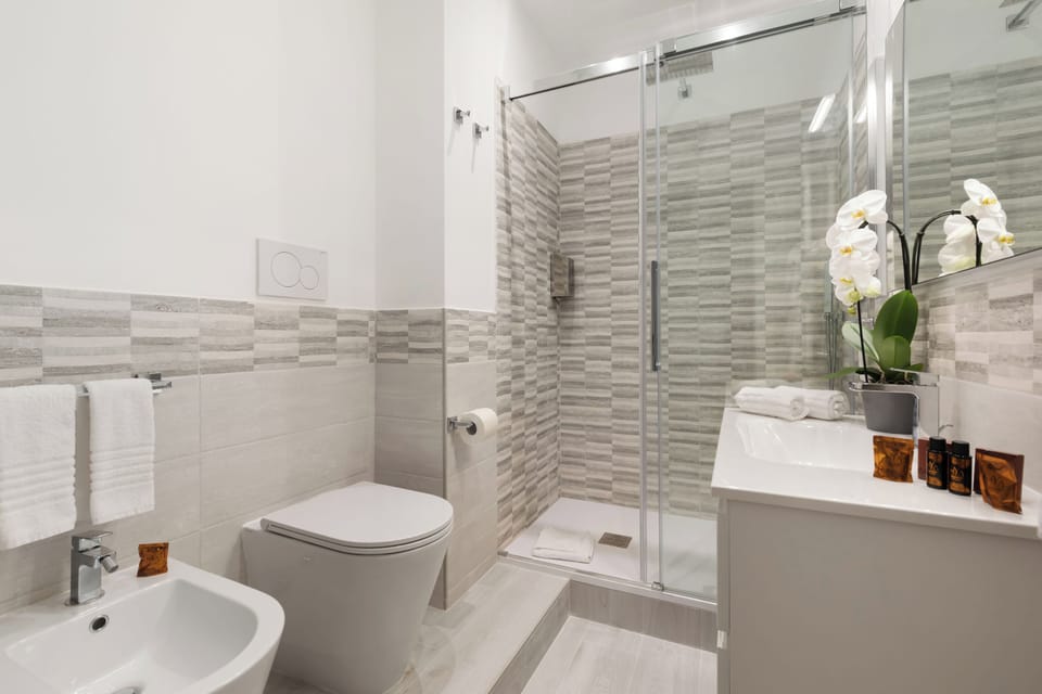 Bathroom | Shower, hair dryer, bidet, towels
