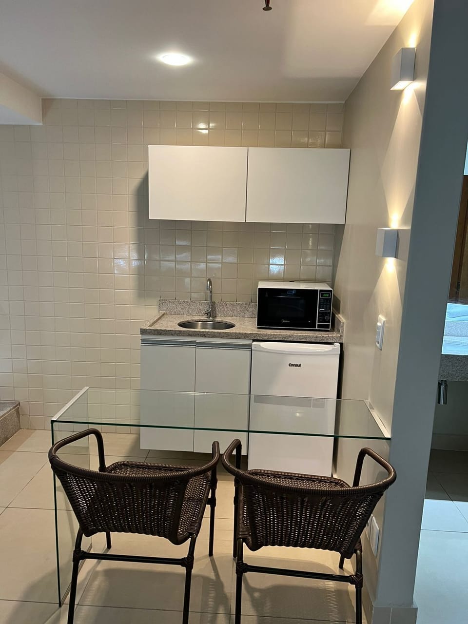 Superior Suite, 1 Bedroom, Kitchenette, Pool View | Private kitchen | Mini-fridge, microwave, highchair, dining tables