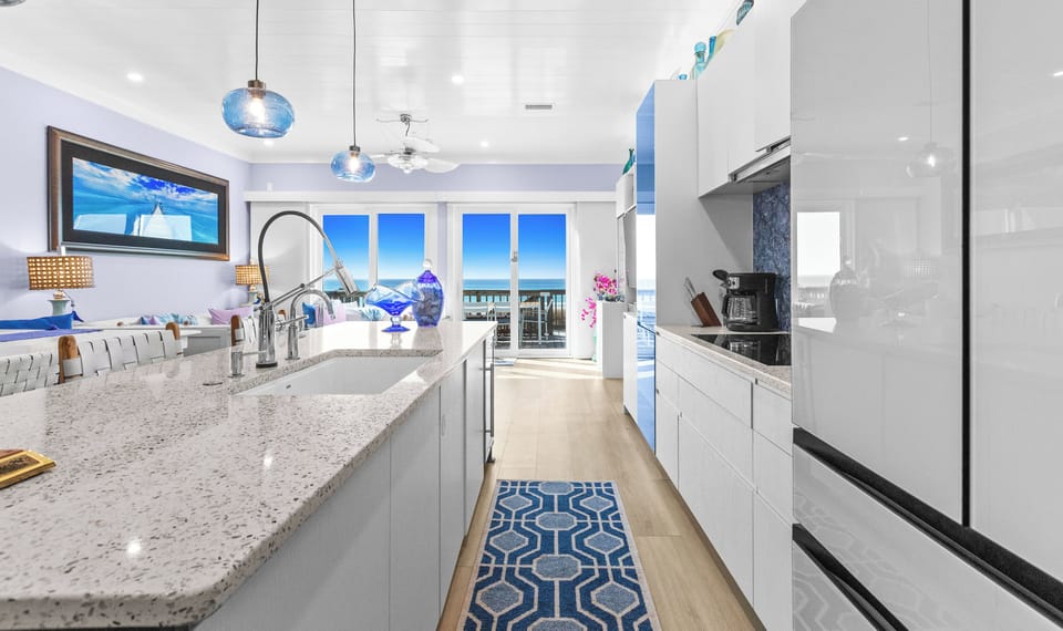 Gourmet kitchen is stocked with high-end appliances