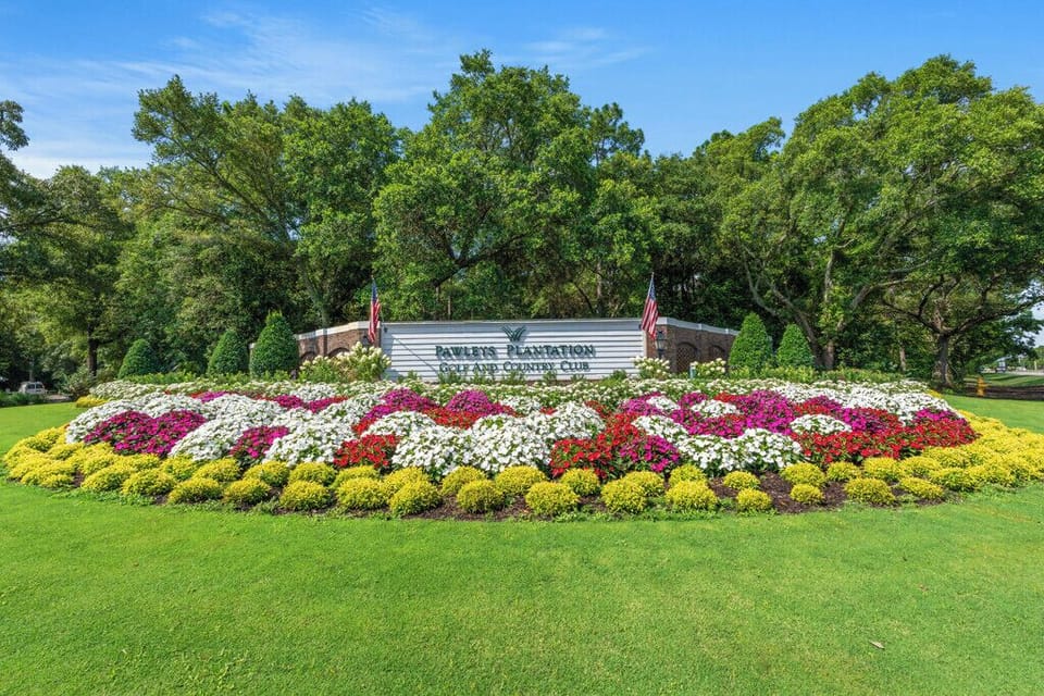 Beautifully maintained Pawleys Plantation entry from Hwy 17. Gated Community. 