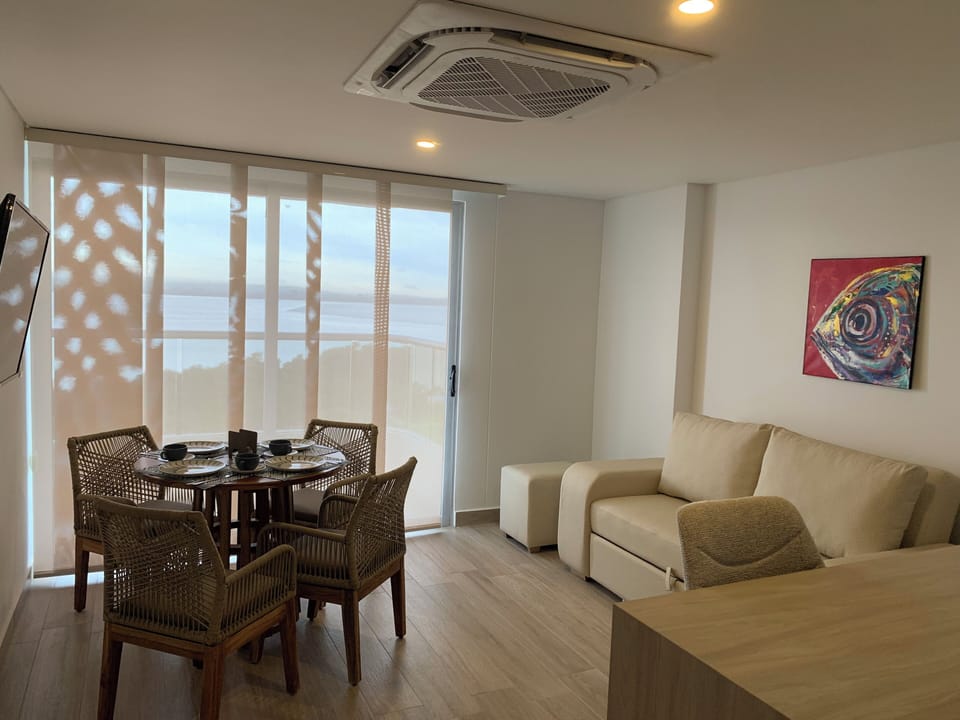 Superior Apartment, Balcony, Bay View | Living area | Flat-screen TV