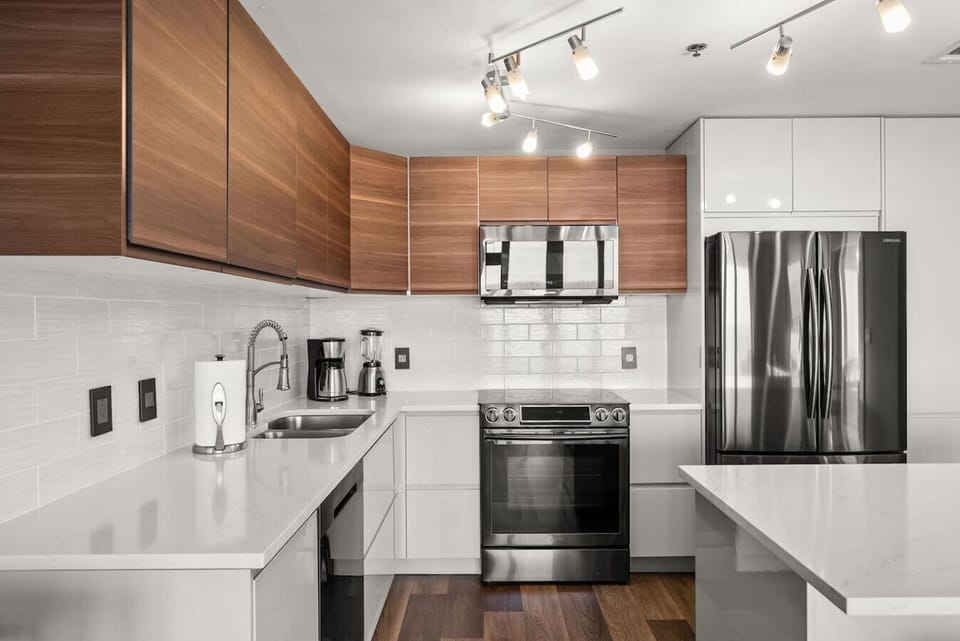 Modern cabinetry, premium finishes, and everything you need for cooking at home.