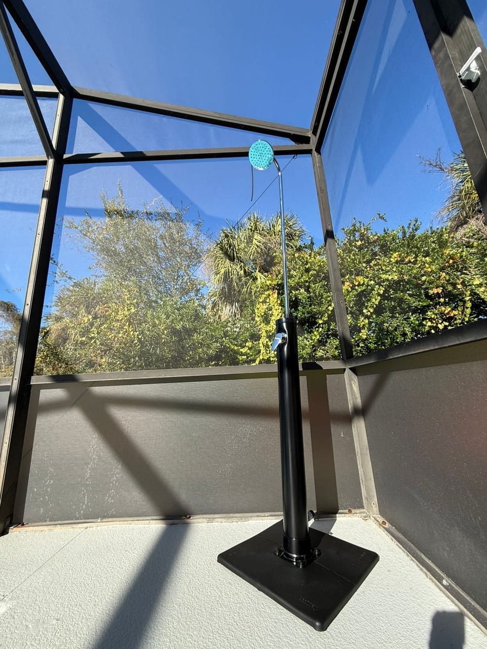 Perfect for families! Enjoy a private backyard with a BBQ grill and a screened-in outdoor shower.