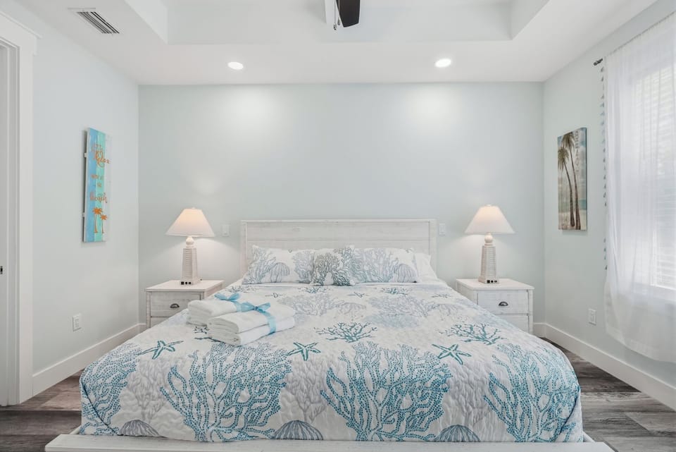 Relax in your main king bedroom at the end of a long day with a book.