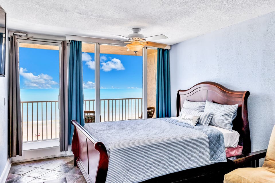 Wake up to breathtaking ocean views in this oceanfront bedroom with direct balcony access. Perfect for a peaceful beach stay, featuring coastal comfort, natural light, and front-row views of sand and sea.
