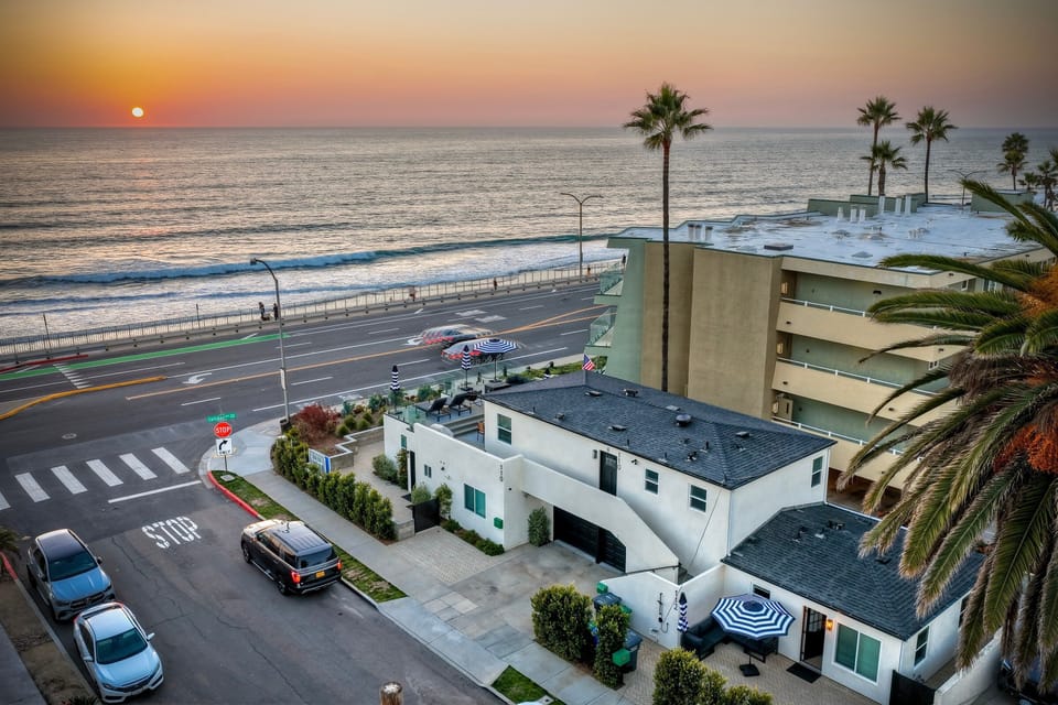 Sunset coastline retreat with unbeatable beachside location