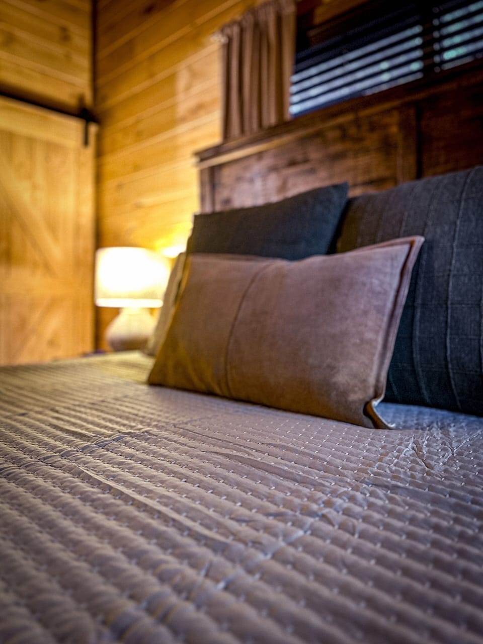 Comfy bed in upstairs bedroom, designed for rest and relaxation