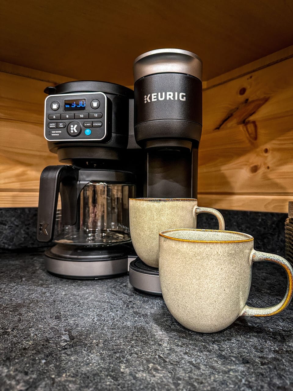 Coffee station with machine and mugs, ready for your perfect morning brew