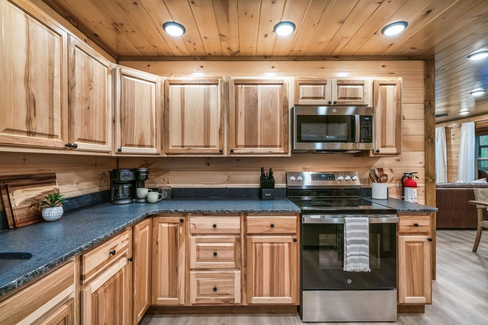 Full kitchen stocked with essentials for your stay