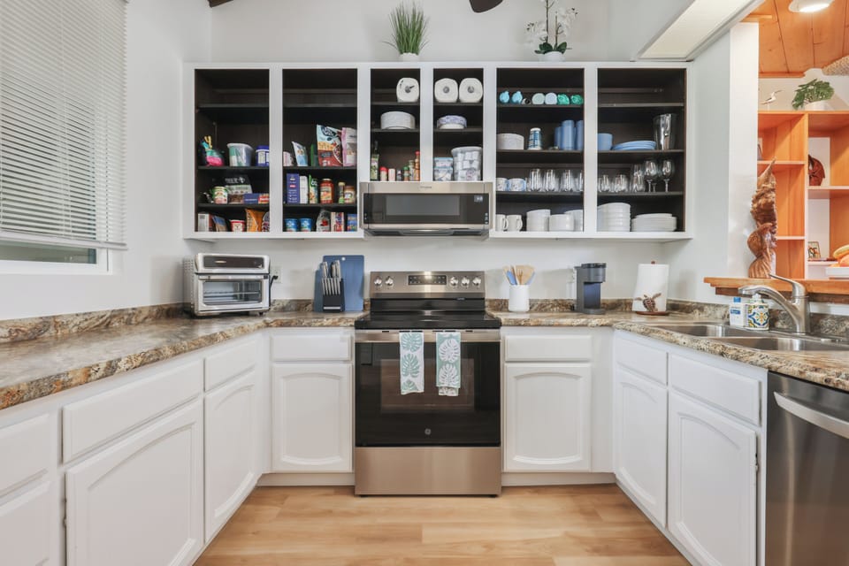 Kitchen - includes dishwasher, microwave, fridge, toaster oven, coffee maker....