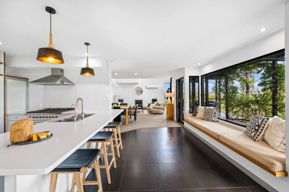 Fully equipped kitchen with breakfast bar and window seat