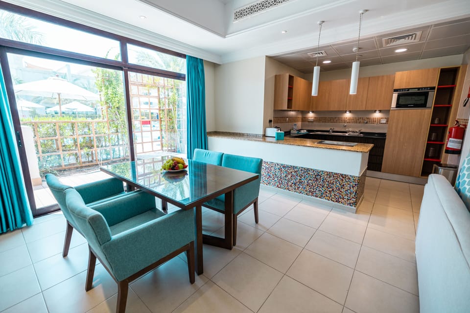 Two Bedroom Garden Pool view | In-room safe, laptop workspace, free WiFi, bed sheets