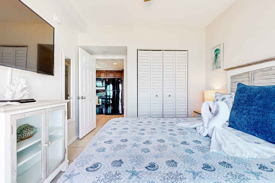 This serene bedroom offers the perfect beach stay retreat with coastal décor, plush bedding, and modern comforts. Unwind after a day at the beach and enjoy a peaceful night's sleep near the ocean.