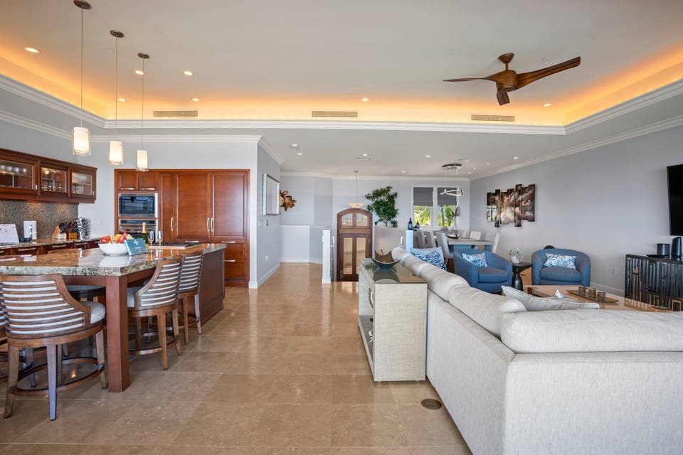 A bright and airy layout combining the kitchen, dining, and living areas for seamless entertaining